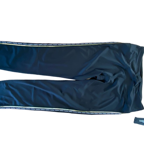 Bebe leggings with gold striping down legs classic Bebe logo repeated - Picture 3 of 9